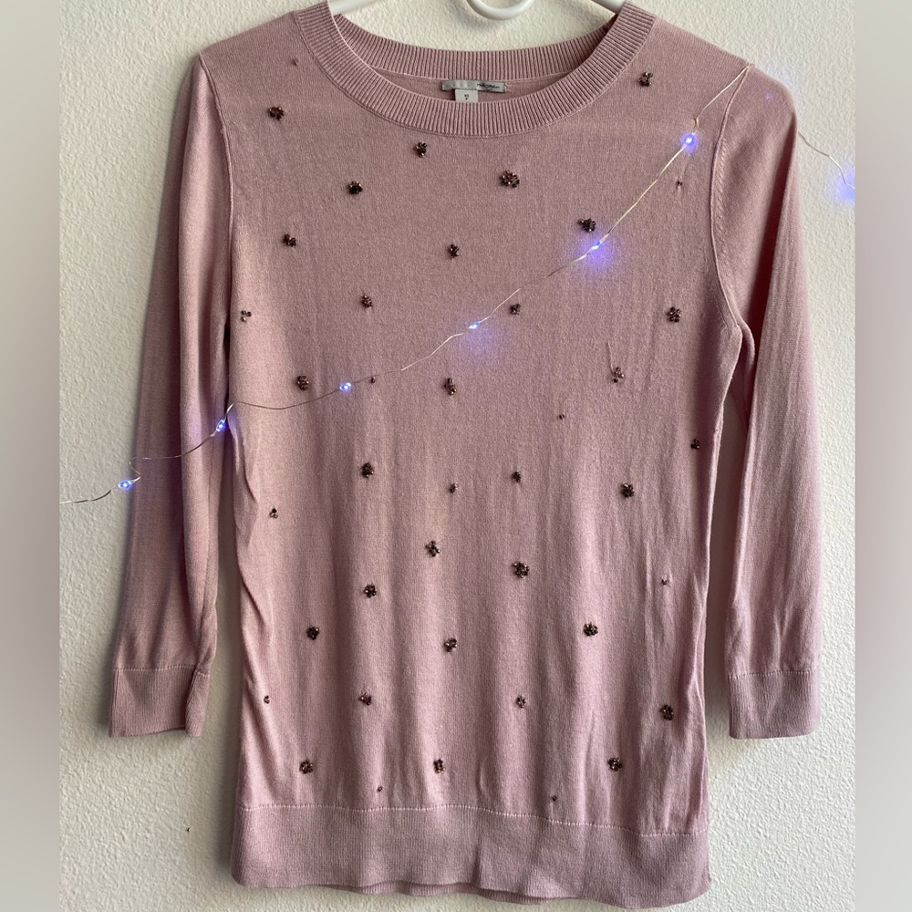 Powdery pink sweater in good condition